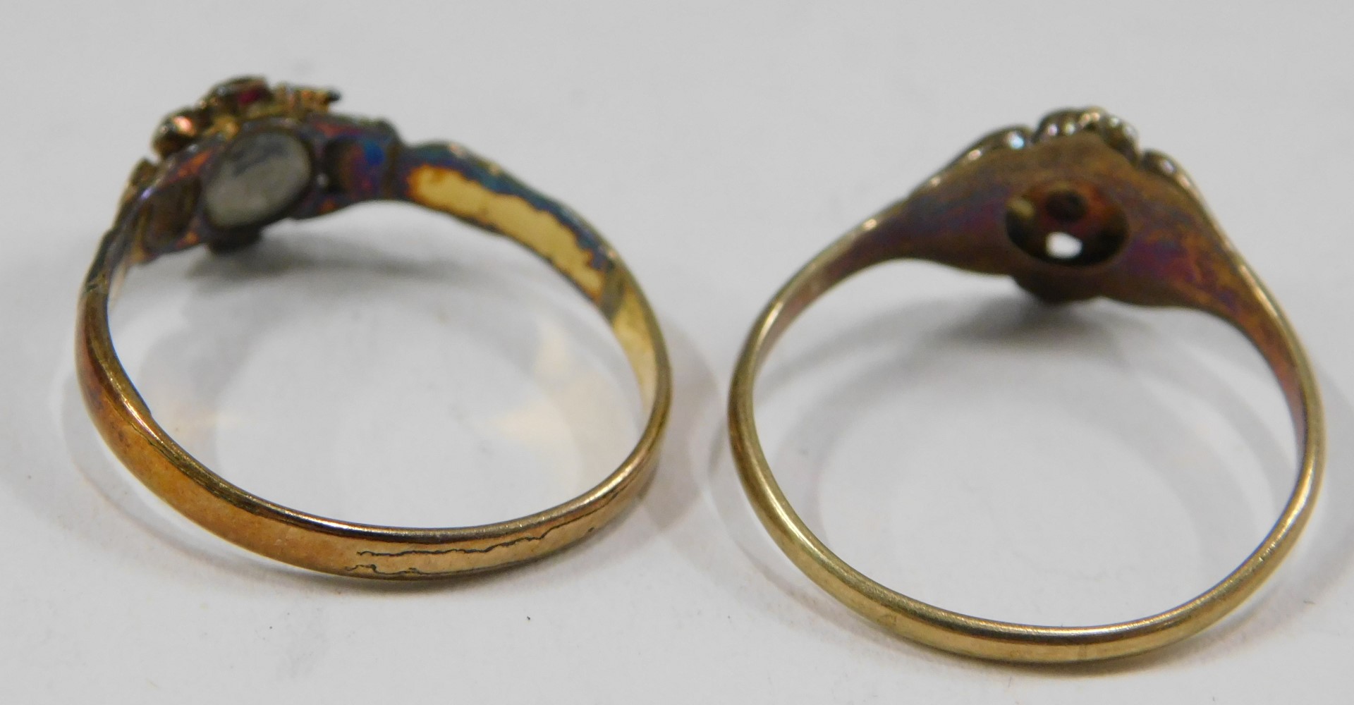 Two dress rings, comprising an Edwardian cluster ring, set with garnets and seed pearls, on a yellow - Image 2 of 2