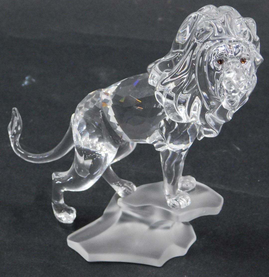 A Swarovski crystal figure group of a roaring lion, on rocked perch, 13cm high, boxed with certifica - Image 3 of 3