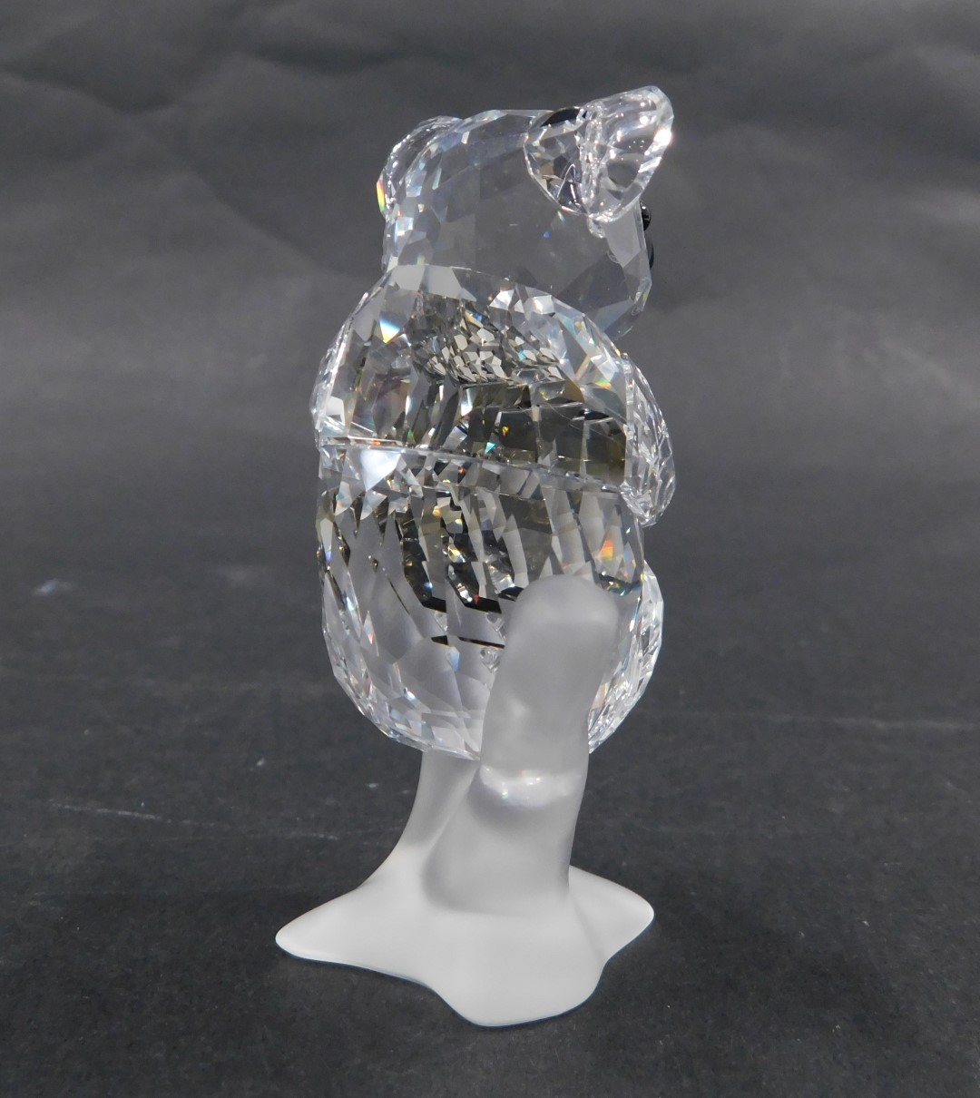 A Swarovski crystal figure group of two koala bears, mother and baby, perched on branch, with black - Image 3 of 3