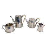An early 20thC silver plated four piece tea and coffee service, with bright cut fan and scroll detai