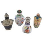 Four ceramic snuff bottles, comprising a Chinese enamel painted snuff, 7cm high, and three others. (