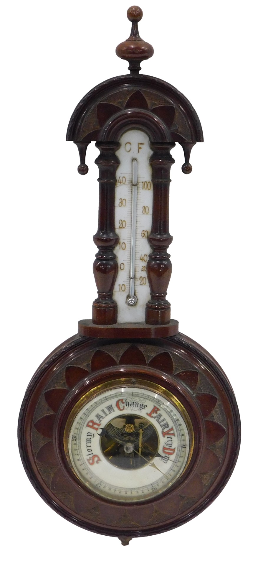 An early 20thC carved mahogany cased aneroid barometer, with opaque glass thermometer, 51cm high.
