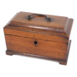 A George III mahogany tea caddy, the canted hinged lid with a brass handle enclosing vacant interior