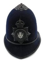 A Nottinghamshire police helmet, with crown for King George V.