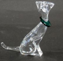 A Swarovski crystal stylised cat figure, with a green crystal collar, 13cm high, boxed.