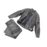 A black leather motorcycle jacket, size 42, and a pair of black leather trousers, size 34.