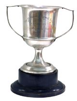 A St Aidan's Scout Group Committee Coronation silver cup, with two handles, on black ebonised socle