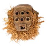 A Liberian Grebo Beyed warrior mask, 29cm high.