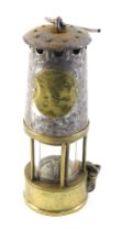 A Protector Type SE brass and steel miner's lamp, 25cm high.