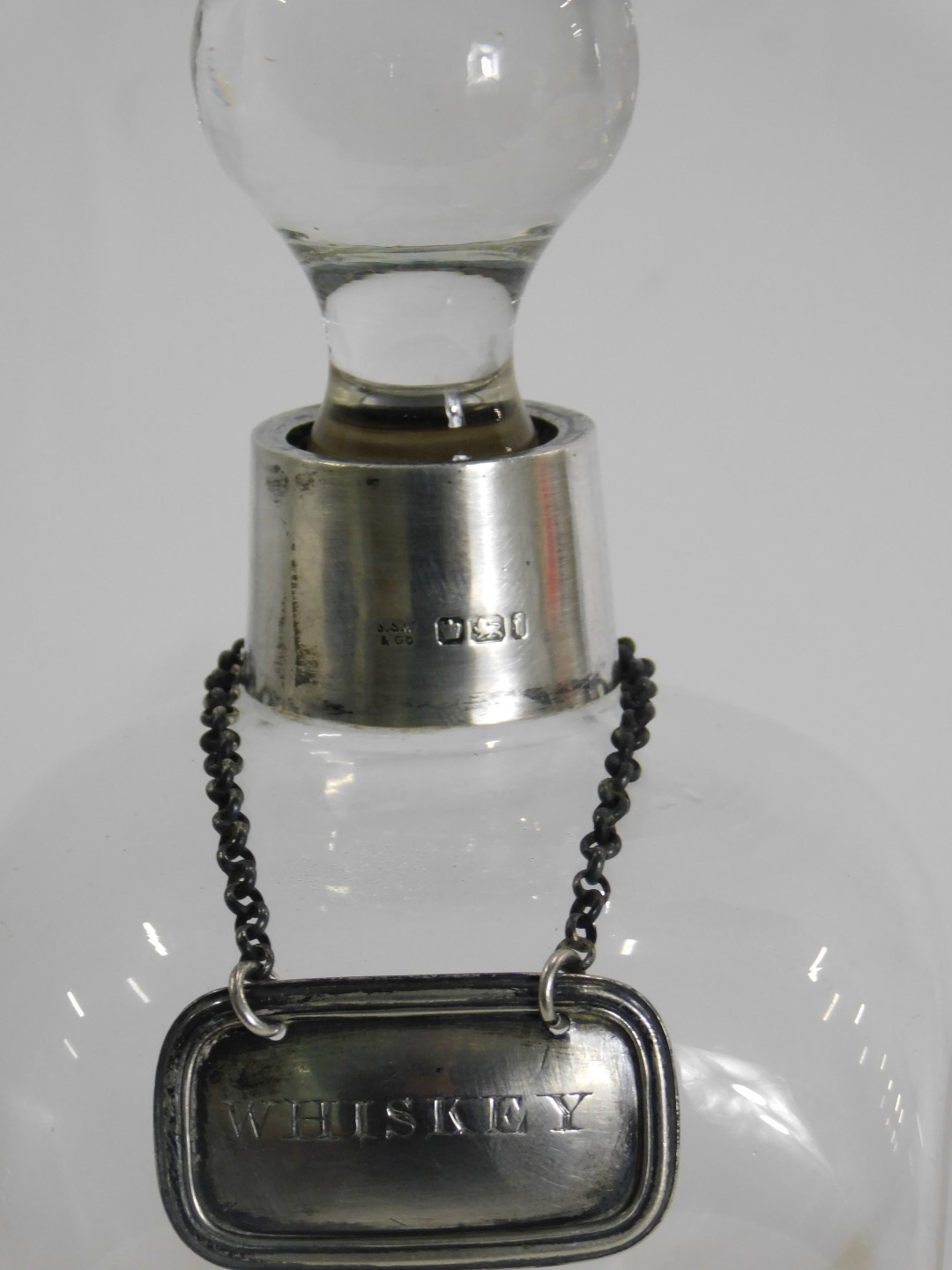 A 19thC balloon glass decanter, with silver collar and white metal whisky label, the collar Sheffiel - Image 2 of 2