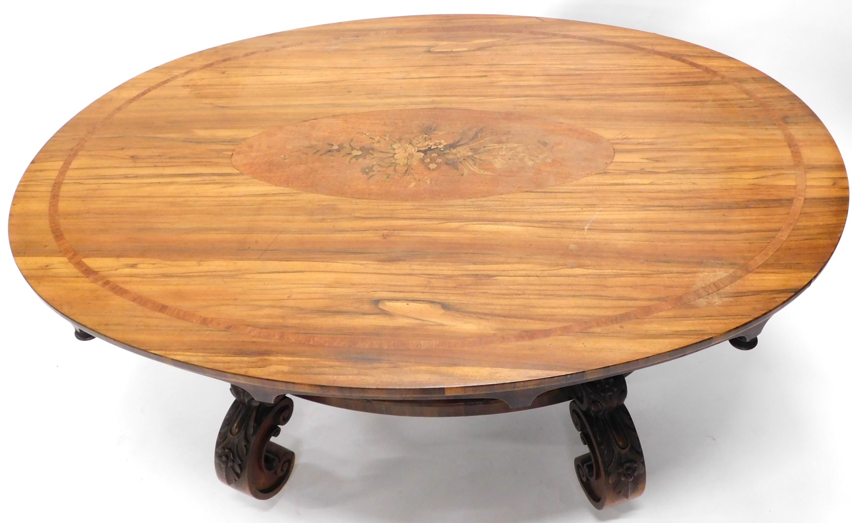 A 19thC rosewood and marquetry centre table, the oval top inlaid with a spray of flowers and leaves, - Image 2 of 2