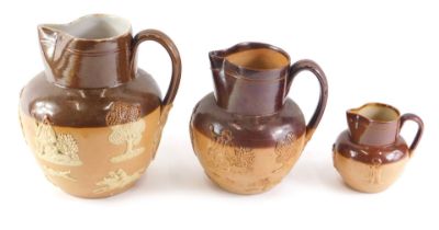 Three Royal Doulton brown stoneware jugs, each decorated in typical form with tavern scenes, hunting