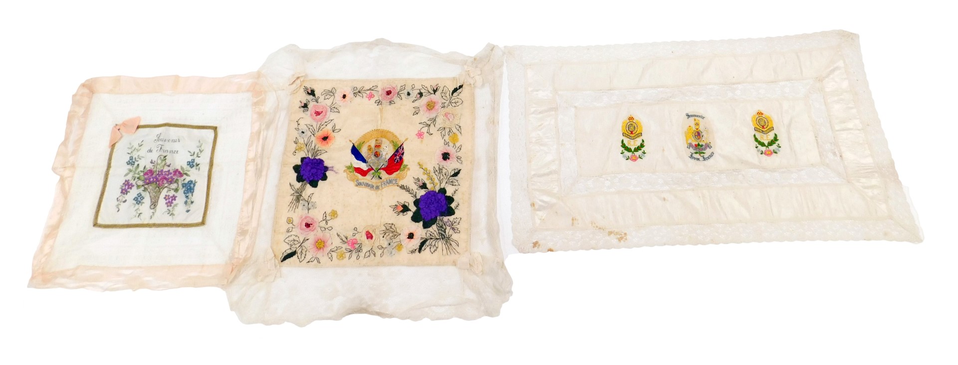 A collection of WWI related embroideries, each decorated with various emblems, titled souvenir Franc