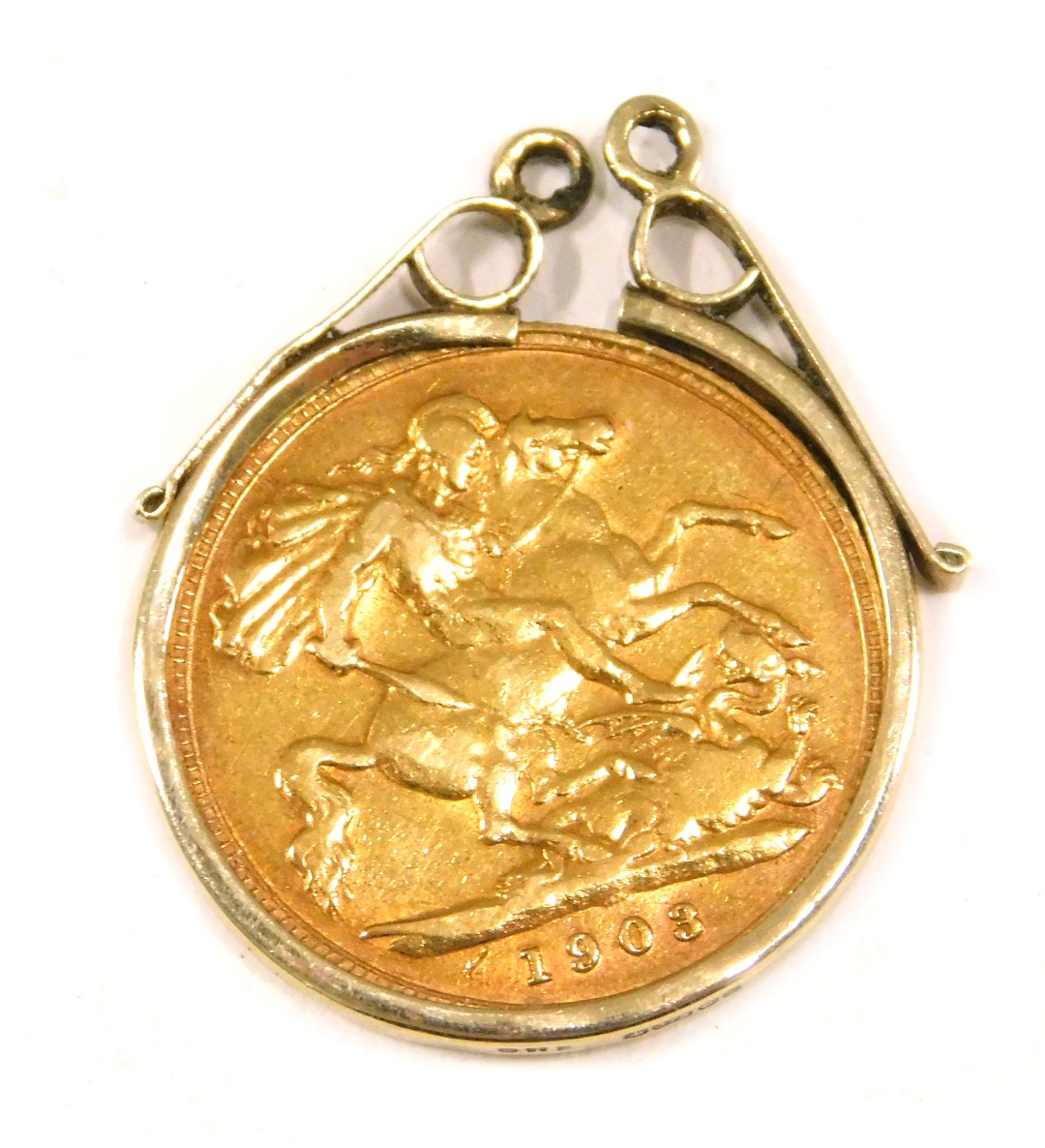 An Edward VII half gold sovereign, dated 1903, in a 9ct gold mount, 4.6g.