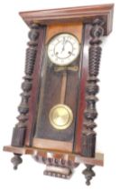A Vienna wall clock, in walnut case, 77cm high. (AF)