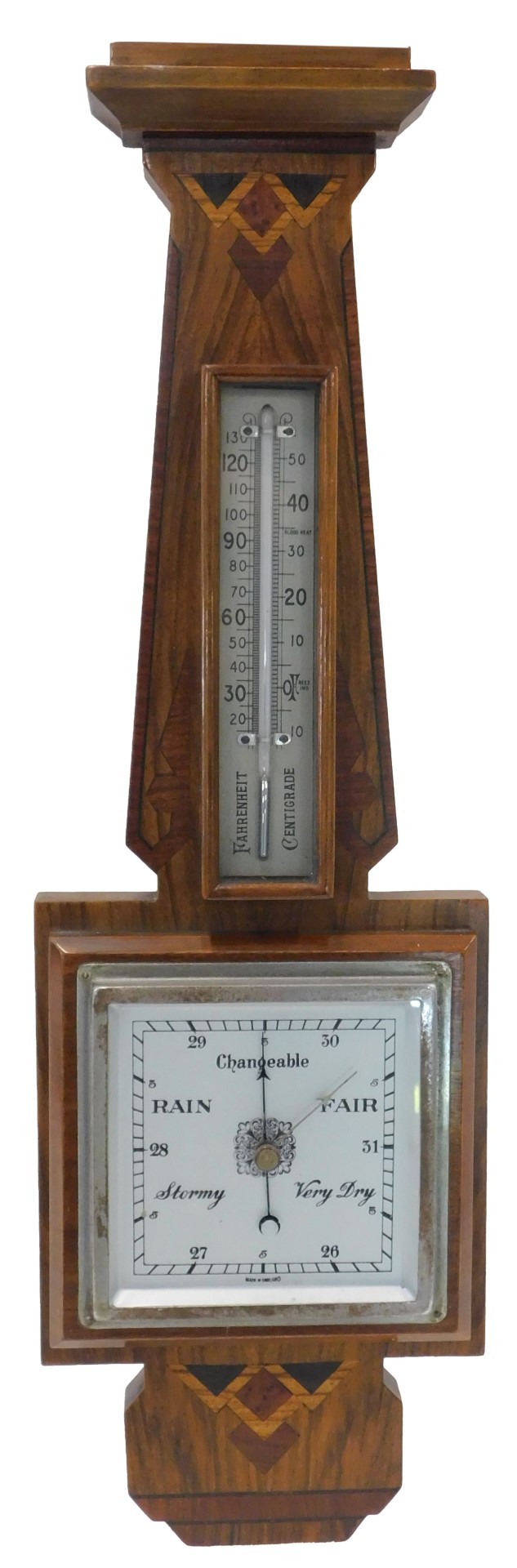 An Art Deco walnut and parquetry aneroid barometer, with thermometer, 58cm high.
