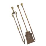 A set of 19thC brass and steel fire irons, comprising shovel, tongs and poker.