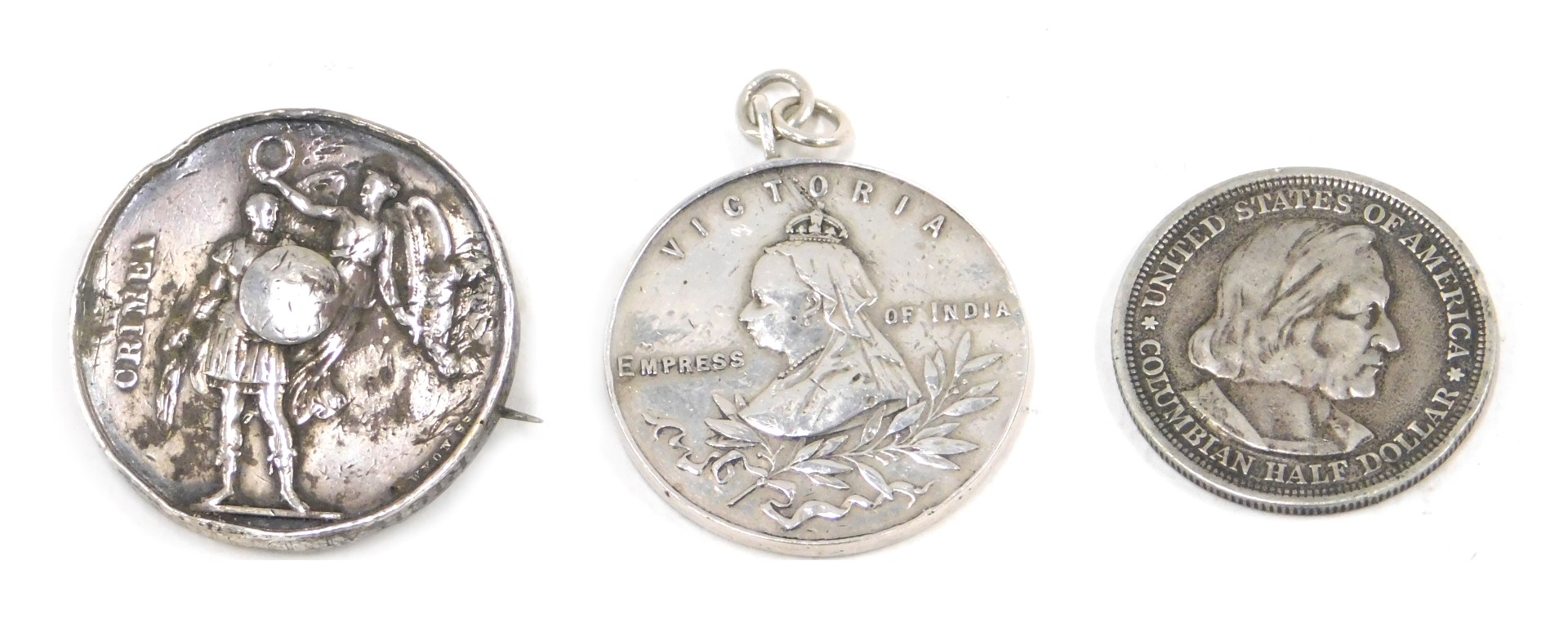 A silver commemorative Victoria medal, dated 1901, a Victoria silver crown dated 1874 converted to a