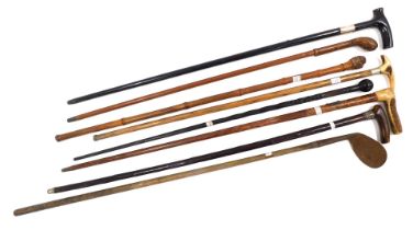 A quantity of silver mounted and other walking sticks, to include one bearing plaque for the SS Rene