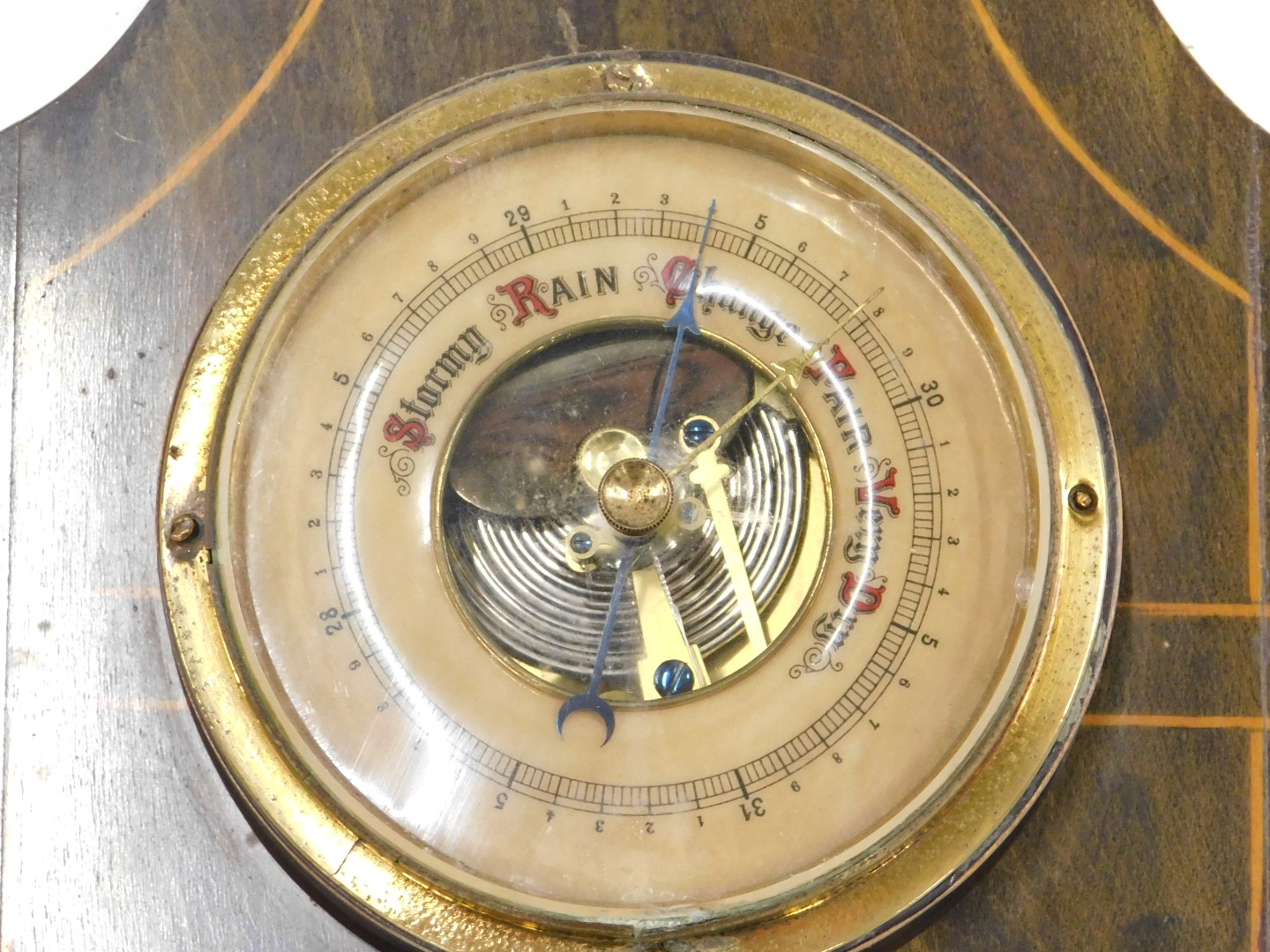 An Edwardian inlaid and stained wood aneroid barometer, with opaque glass thermometer, 49cm high. - Image 2 of 2