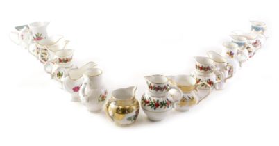 A collection of Royal Worcester miniature jugs, each decorated in 18th and 19thC style with flowers,