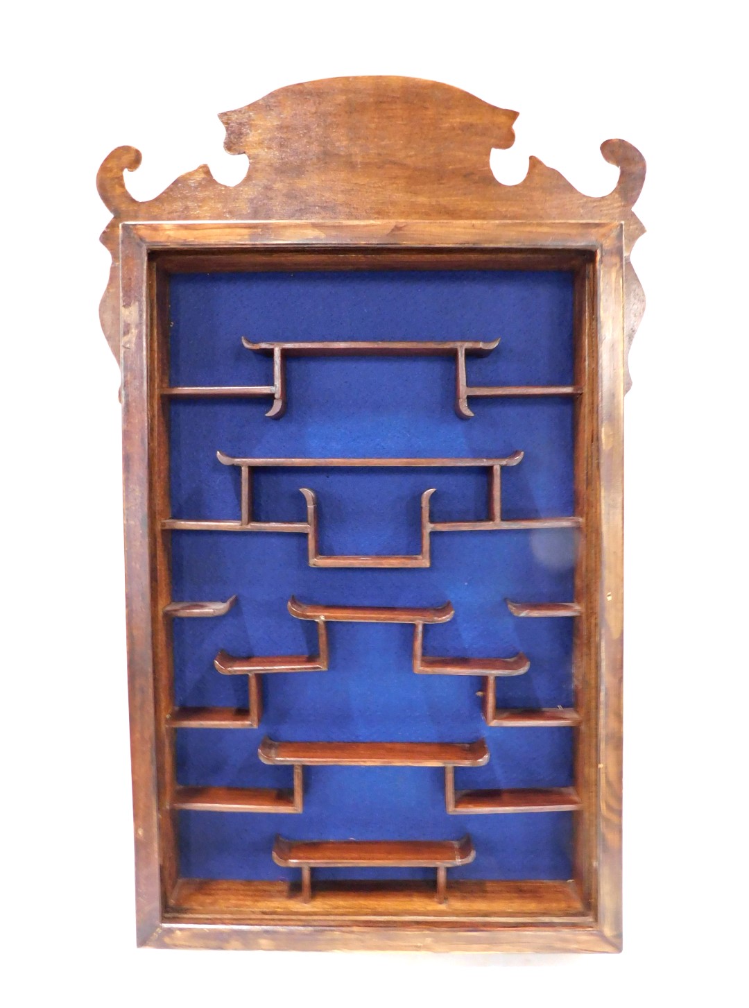 A set of Chinese style display shelves, with shaped fret cornice, 88cm high, 56cm wide.