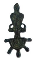 A bronze antiquity artefact, shaped as warrior with demi-lune base, 6cm high.