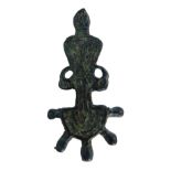 A bronze antiquity artefact, shaped as warrior with demi-lune base, 6cm high.