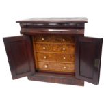 A Victorian miniature cabinet, the rectangular top with a moulded edge above a frieze drawer and two