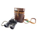 A pair of German WWII binoculars, stamped with the eagle and ARTL, 7x50 BEH35487KF, 22cm high, in as