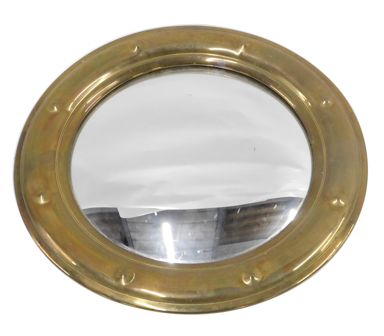 A 20thC brass ship's mirror, with buttoned outer frame, on convex mirror plate, 39cm diameter.