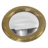 A 20thC brass ship's mirror, with buttoned outer frame, on convex mirror plate, 39cm diameter.