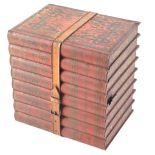 A Huntley & Palmer's biscuit tin, modelled in the form of a stack of books, 16.5cm long.