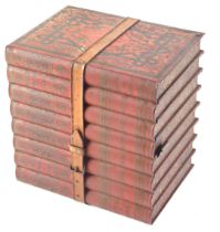 A Huntley & Palmer's biscuit tin, modelled in the form of a stack of books, 16.5cm long.