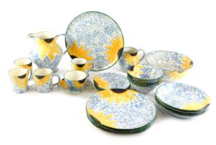 Various items of Poole hand painted pottery, each decorated with sunflowers on a mottled green groun