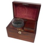 A 19thC mahogany tea caddy, with a boxed interior and cut glass bowl, with mother of pearl lock disk