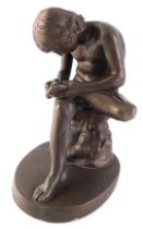 An Austin resin sculpture, of Spinario, or the boy seated with thorn, on oval base, 23cm high.