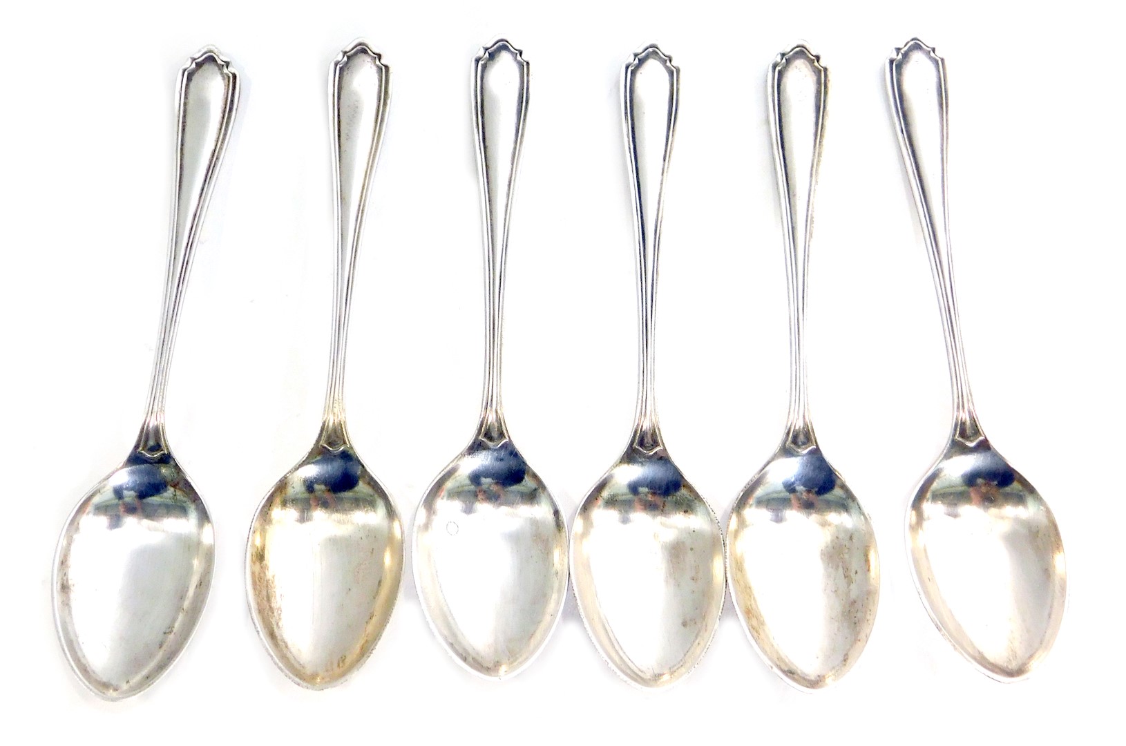 A set of six George V silver teaspoons, each with arched top and reeded border, maker HA, Sheffield