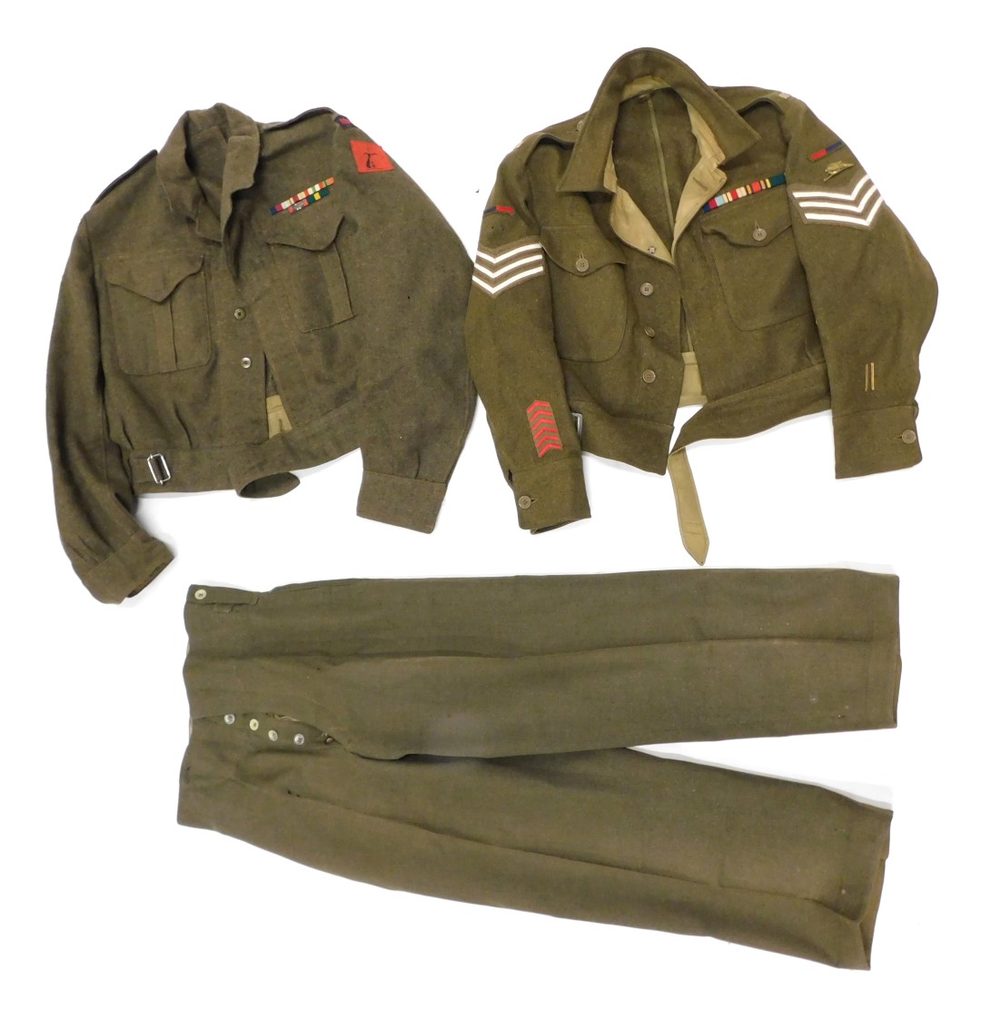 A Royal Artillery green dress uniform, an RHA waistcoat and pair of trousers, with various badges an