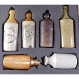 Six Victorian stoneware bottles, to include Idris ginger beer, M.Deehan Londonderry, and The Fortres