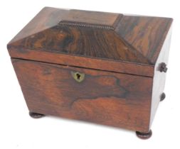 A George III partridge wood tea caddy, with rosewood and boxwood strung borders, and canted corners,