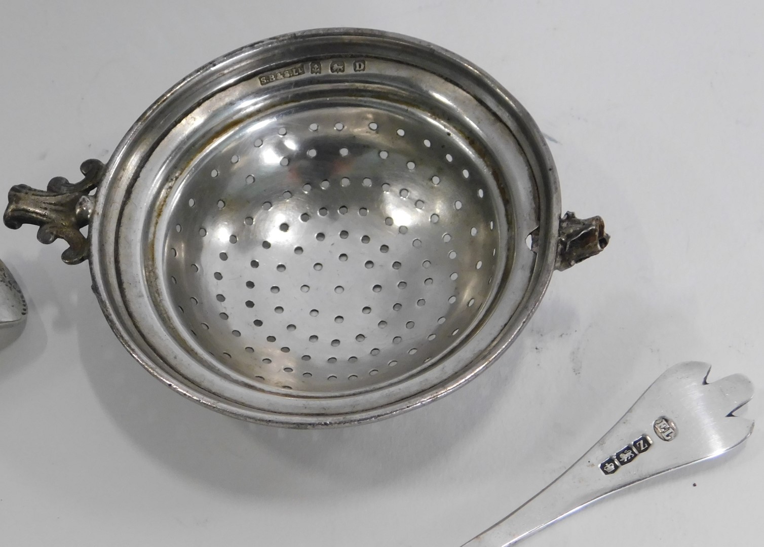 Silver wares, comprising two Victorian silver sifter spoons, Sheffield 1942, and another with arched - Image 3 of 3