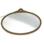 A Barbola 1950s gilt wall mirror, the oval mirror with a raised flower and fruit basket top, with pe