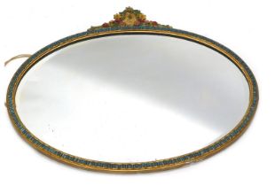 A Barbola 1950s gilt wall mirror, the oval mirror with a raised flower and fruit basket top, with pe