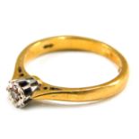 An 18ct gold diamond solitaire ring, set with round brilliant cut illusion set diamond approximately