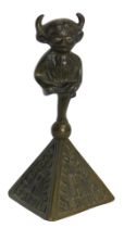 A Harrison and Co Limited of Lincoln brass statue, formed as the Lincoln Imp, on triangular base, 12