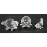 Three Swarovski crystal beavers, comprising two large beavers, 2cm high, and one 1.5cm high, boxed.