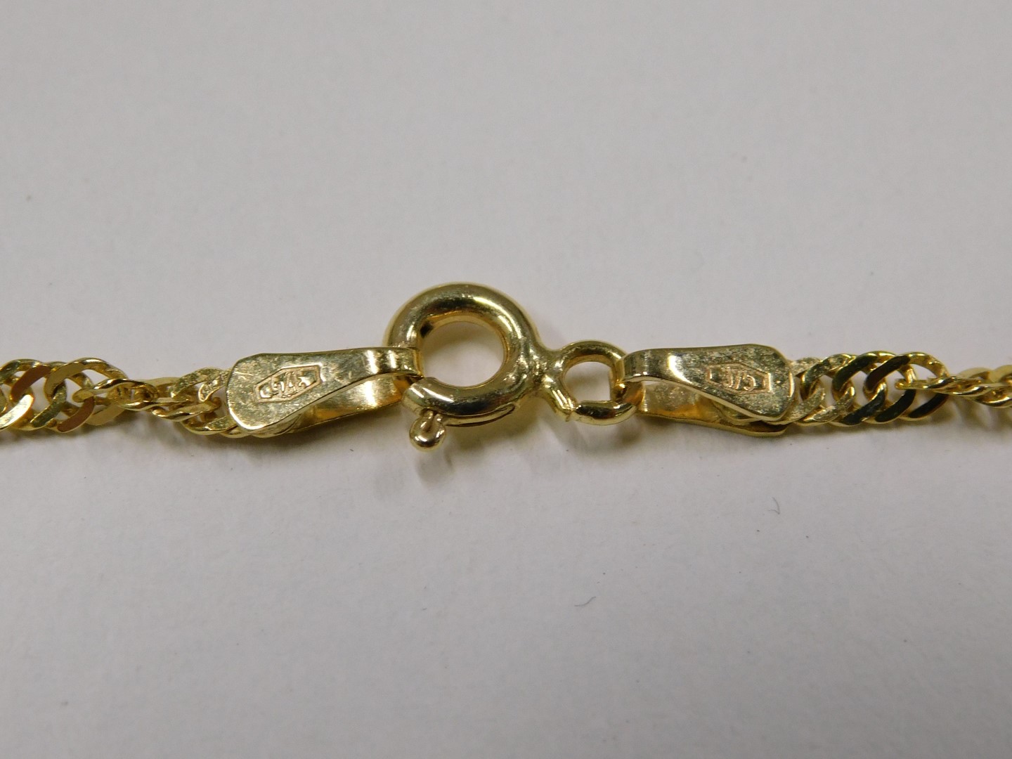 A fancy link neck chain, yellow metal stamped 375, 38cm long, 2.9g. - Image 2 of 2