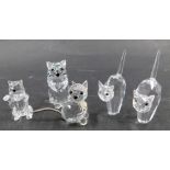 Five Swarovski crystal cat figures, comprising two stylised cats 5cm high, a playing kitten 3cm wide