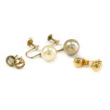 Three pairs of earrings, comprising a pair of cultured pearl and yellow metal screw back earrings, s